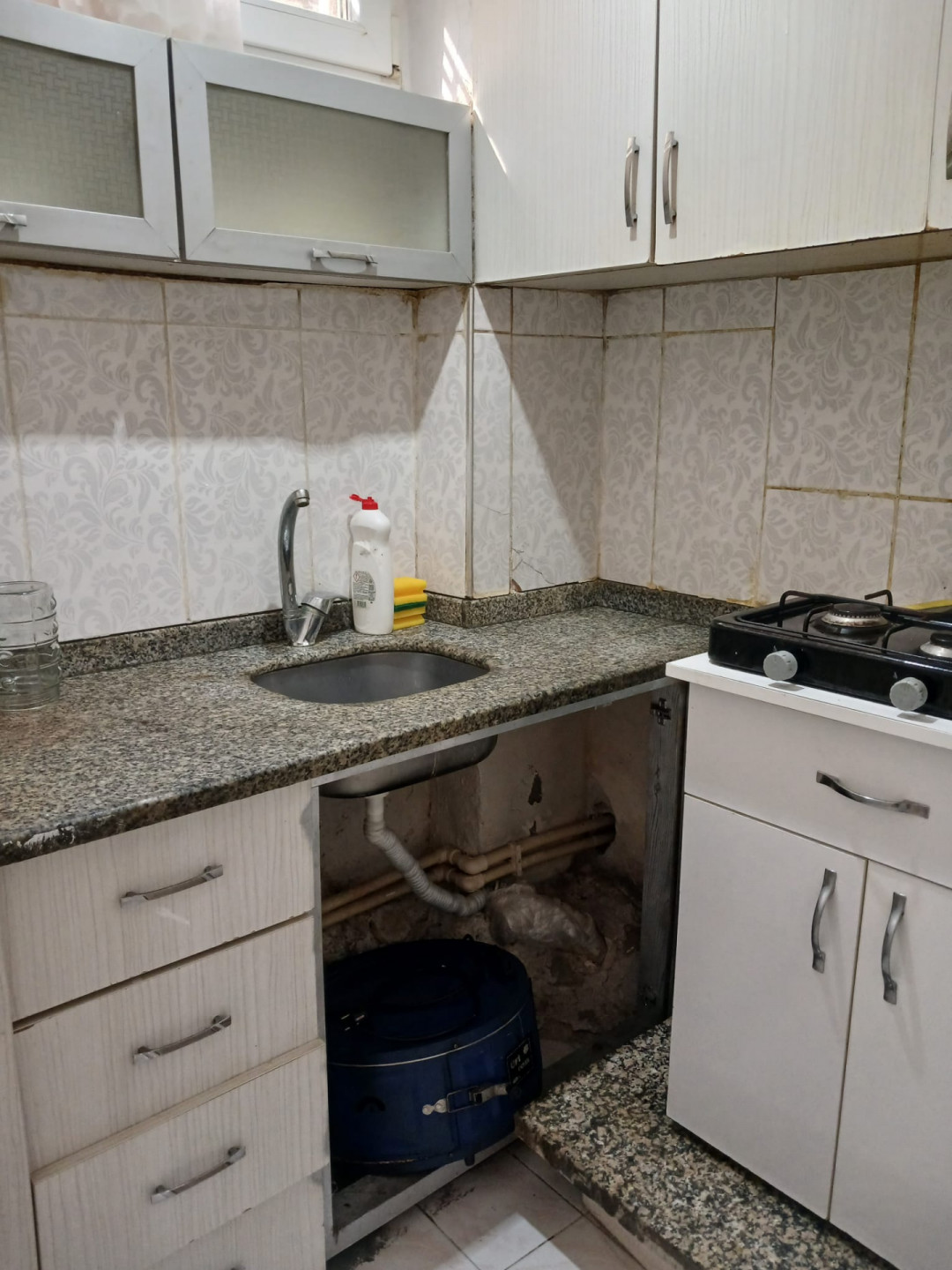 Furnished two-bedroom apartment with a living room, half-basement