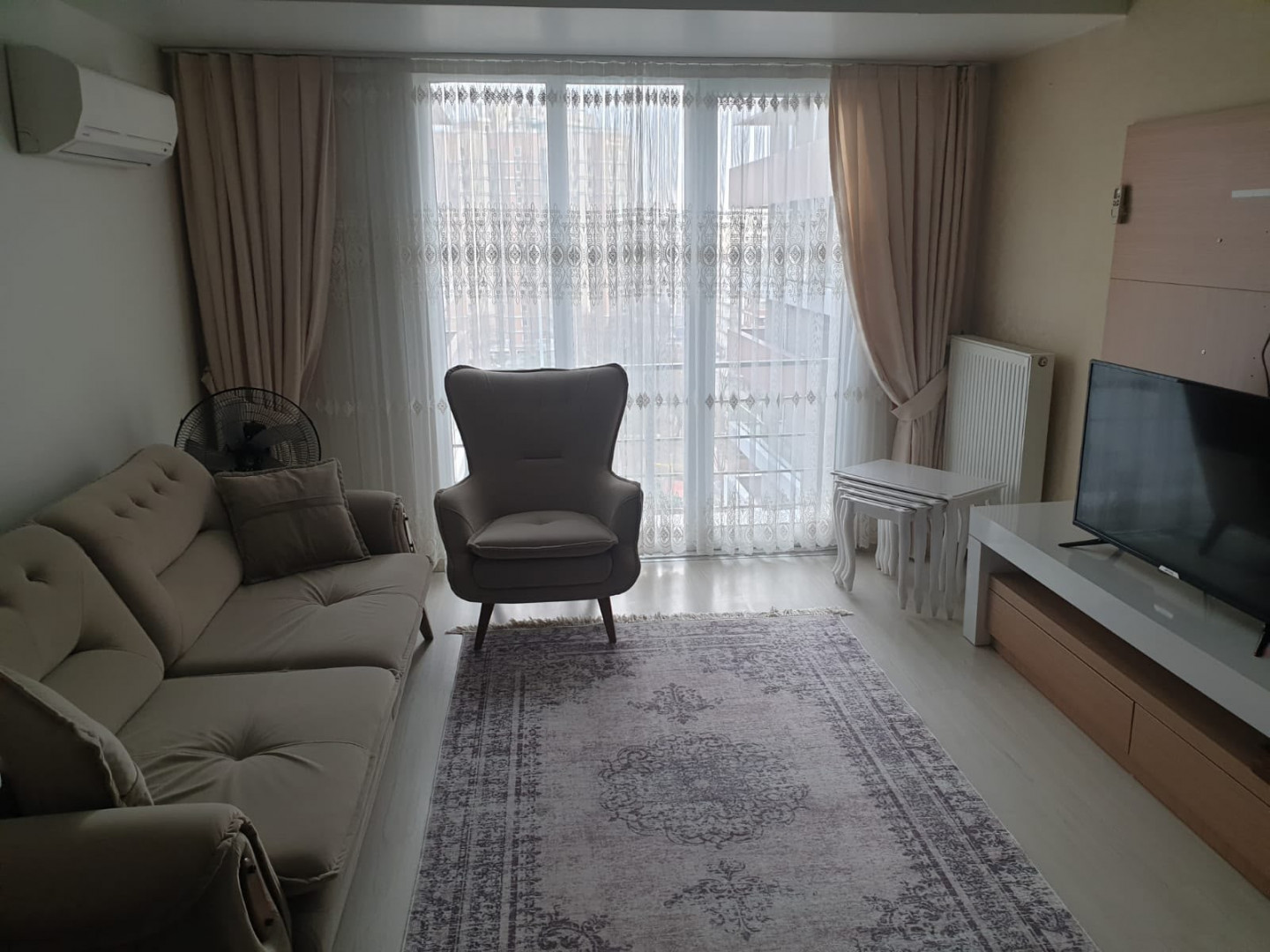 Two-bedroom apartment with a living room in the Kamoush complex