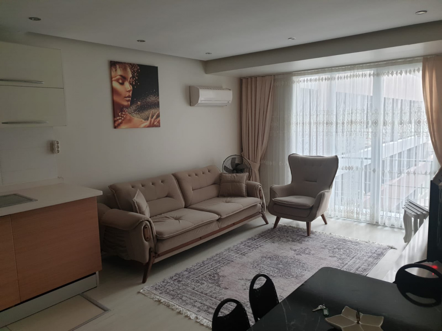 Two-bedroom apartment with a living room in the Kamoush complex