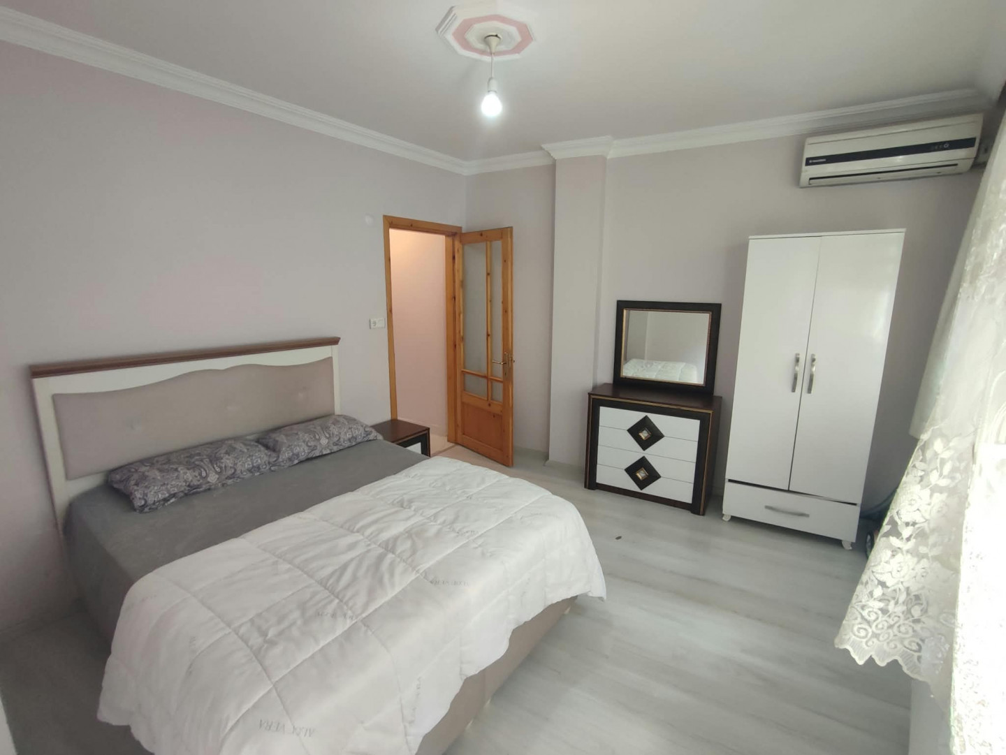 Two-bedroom apartment with a living room, air-conditioned