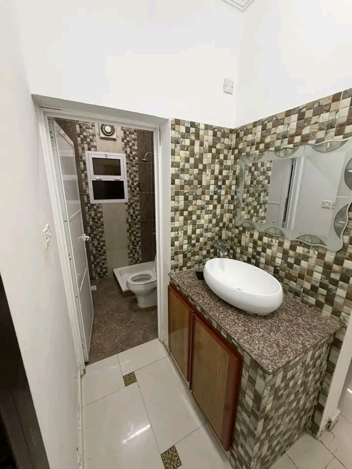 A distinctive apartment in Al Maabilah with an indoor pool