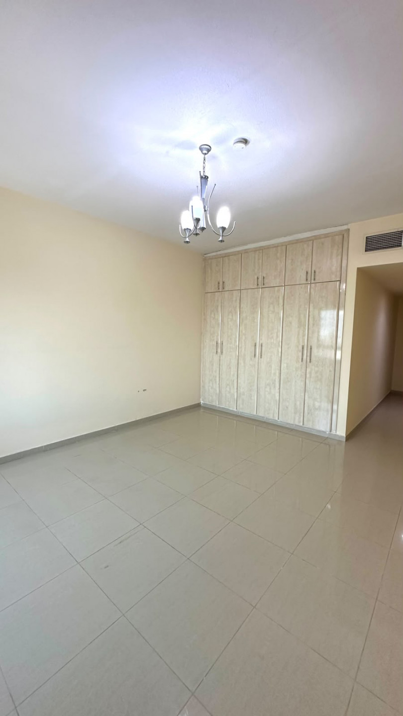 Spacious apartment in a tower in Al Taawun