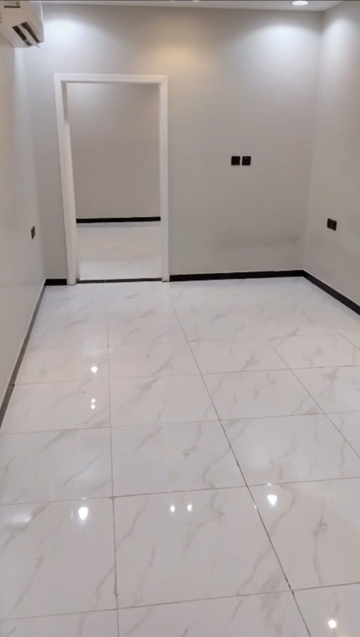 Second floor apartment, two bedrooms and a living room, half furnished