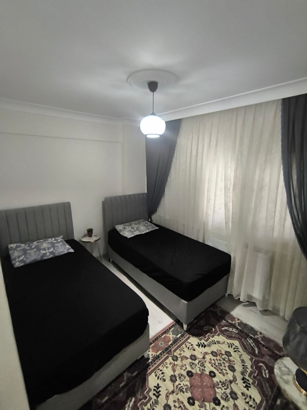 Two-bedroom apartment with a living room, furnished and clean.