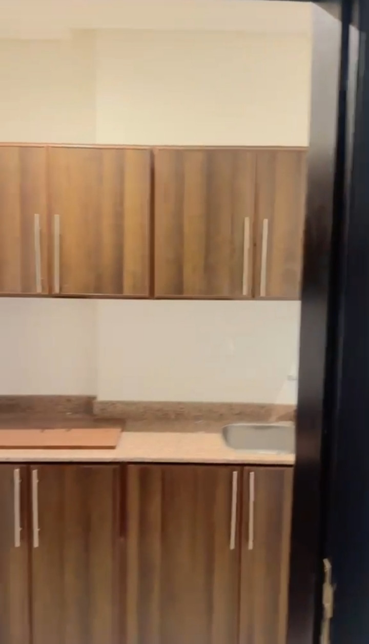 Two-bedroom apartment, small living room, kitchen, and bathroom