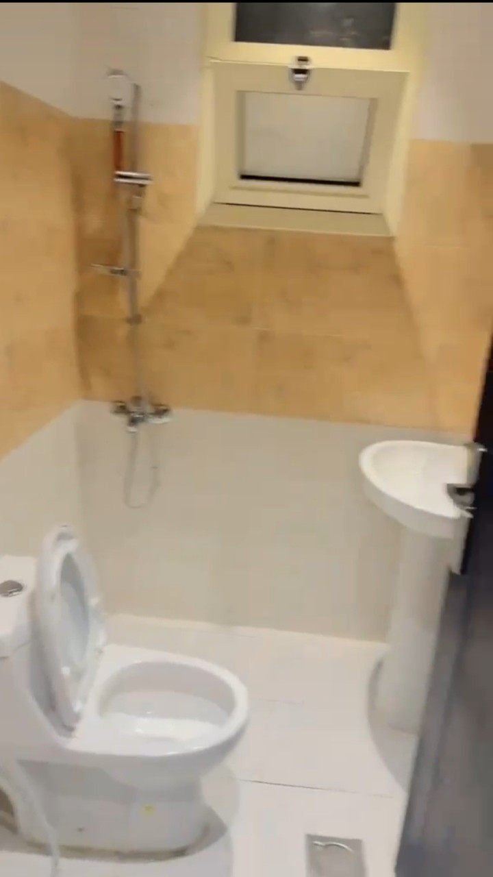Two-bedroom apartment, small living room, kitchen, and bathroom