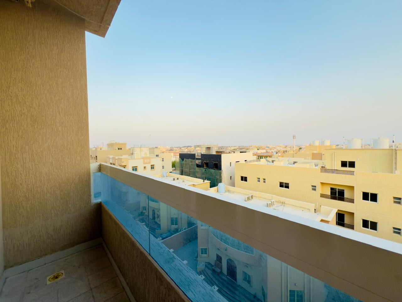 Central air conditioning, two-bedroom apartment with a living room, clean furnishings