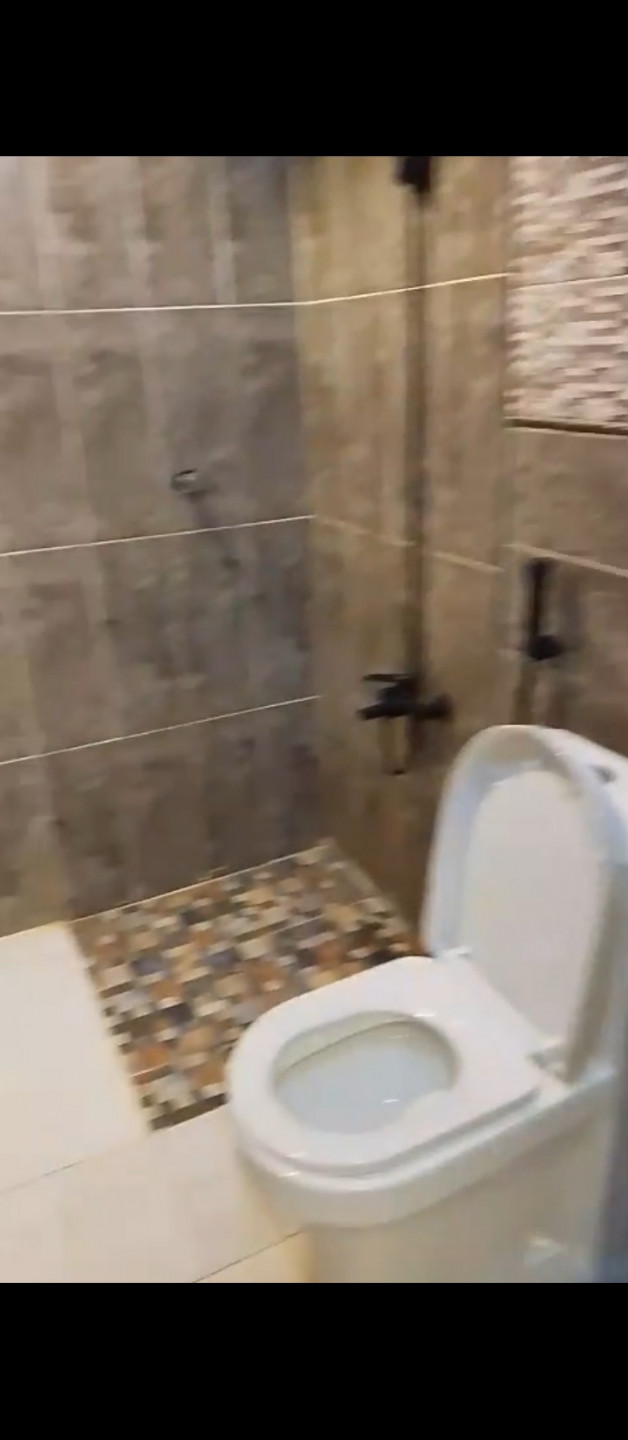 There is an apartment for rent in Al Hamra neighborhood.